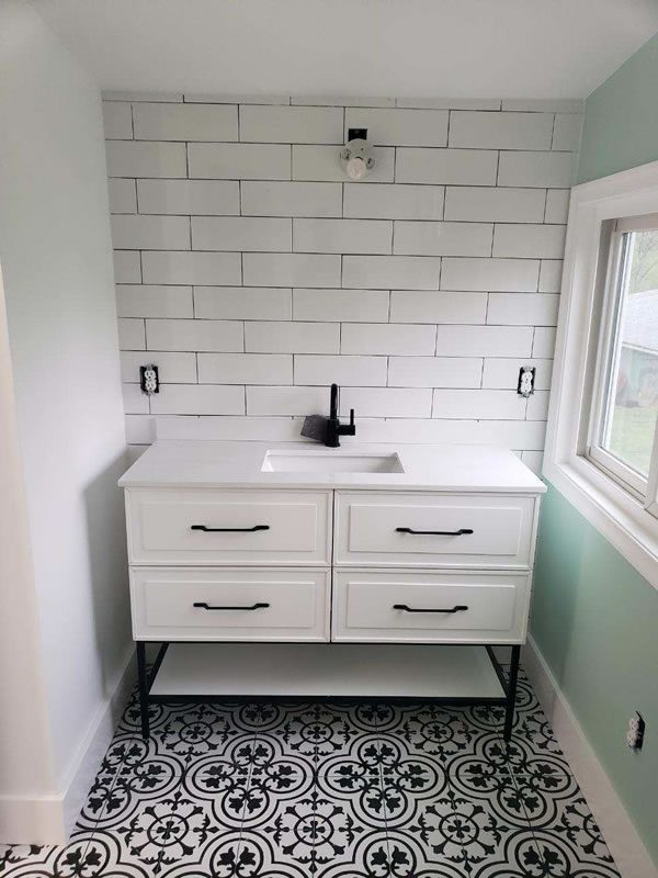 Bathroom vanity with tile backsplash