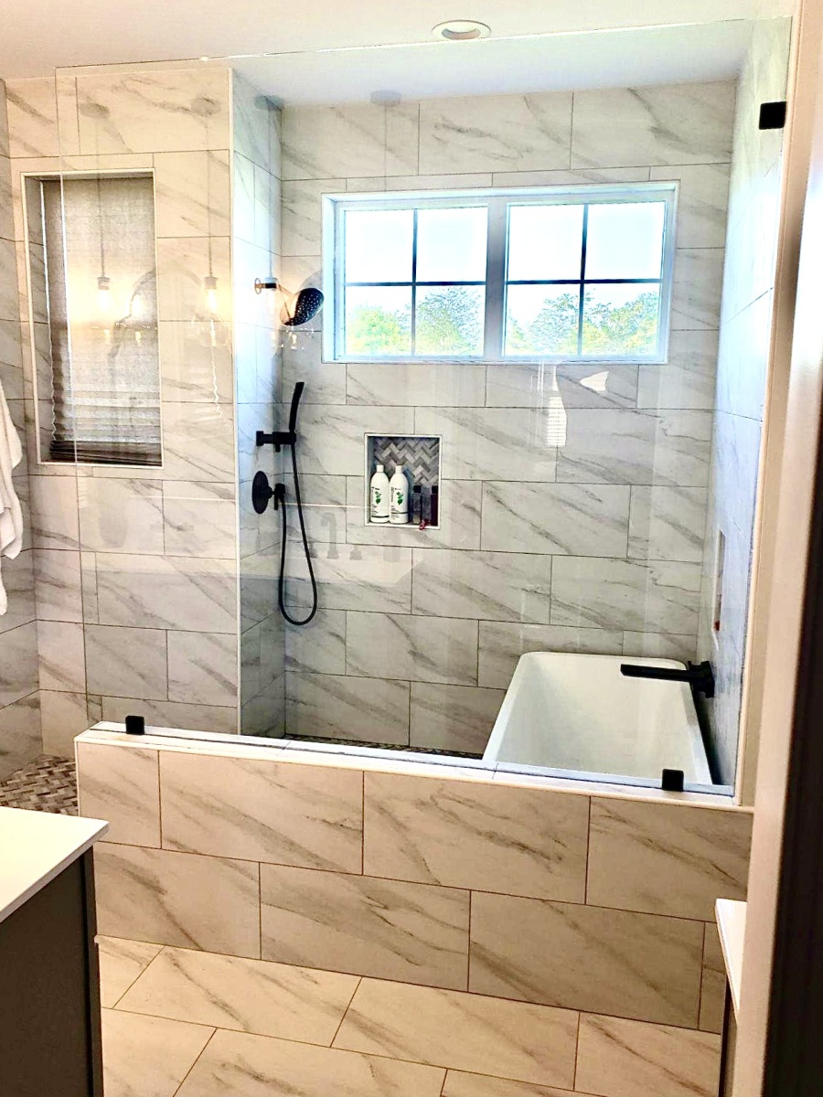 Large-format marble-look tile bathroom